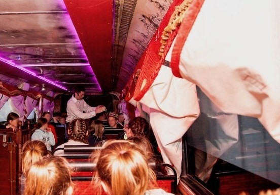 Ghost bus guide telling sppoky stories to children.jpg