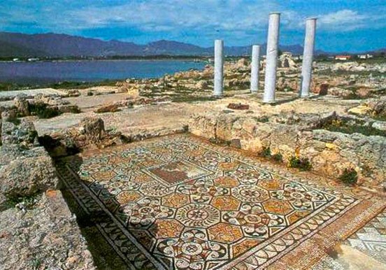 see the ancient Roman city of Nora in Sardinia