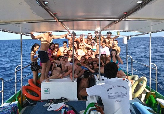 private boat charter passengers group photo in Malta