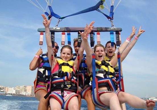 parasailing over Ibiza waters