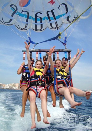 parasailing over Ibiza waters