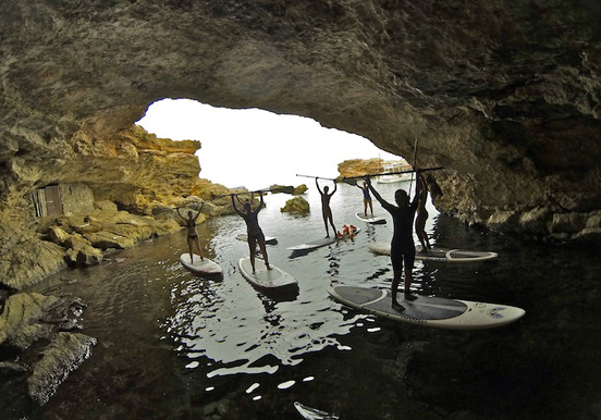 stand up paddle through coastal caves in Ibiza