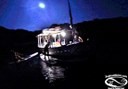 stand up paddle under full moon in Ibiza