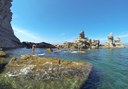 stand up paddle in Ibiza coastal waters and rock formations