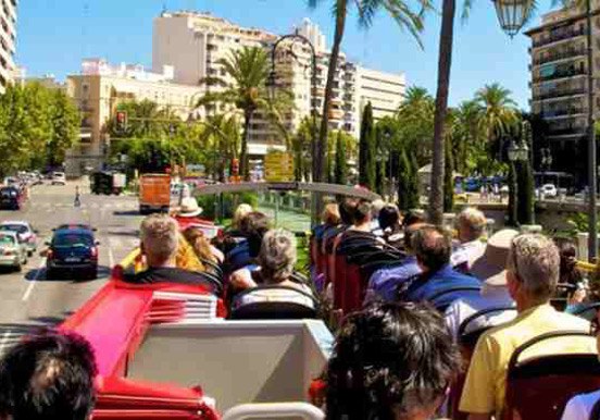 view from open top double-decker bus in Mallorca city tour