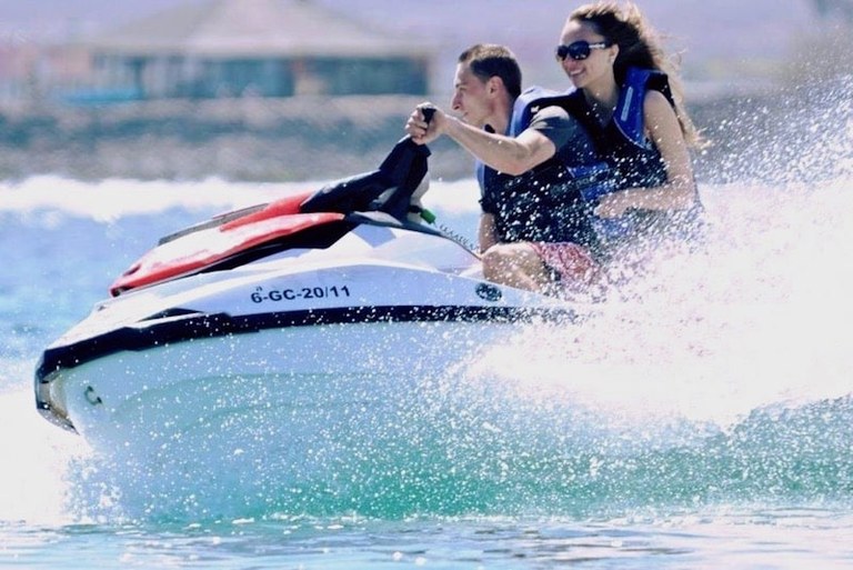 Riding a jet ski in Caleta de Fuste.jpg
