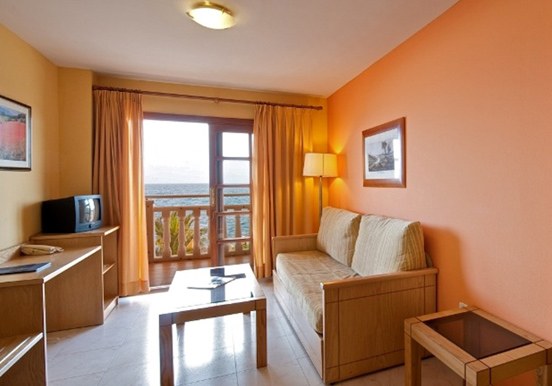 Hotel Elba Castillo apartment living area for surf camp