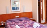 Hotel La Casita bedroom for surf camp