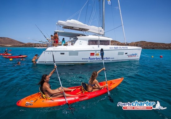 Kayak in crystal clear water of Lobos island.jpg