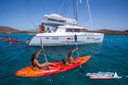 Kayak in crystal clear water of Lobos island.jpg