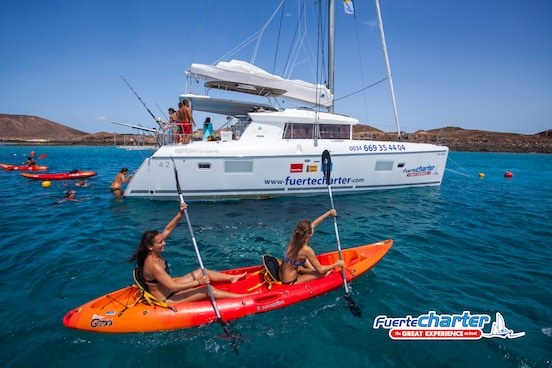 Kayak in crystal clear water of Lobos island.jpg