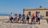 Group of girls on E-bike excursion on Lobos island.jpg