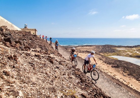 Visiting lighthouse of Lobos island on e-bike.jpg