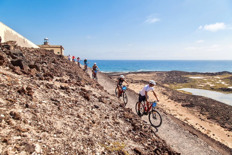 Visiting lighthouse of Lobos island on e-bike.jpg