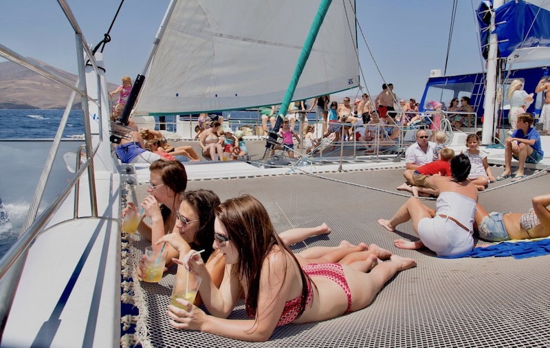 Relax and sunbath on deck Papagayo catamaran trip.jpg