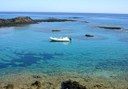 Private boat sailing around Lobos Island