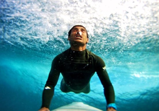 breaking the waves in Corralejo surfing training