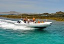 Catamaran sailing around Lobos Island