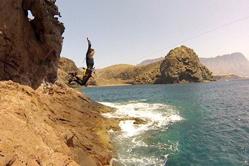 jumping off cliff for Gran Canaria coasteering