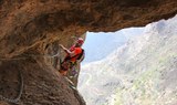 Ferrata climbing in Gran Canaria using chains and stemples