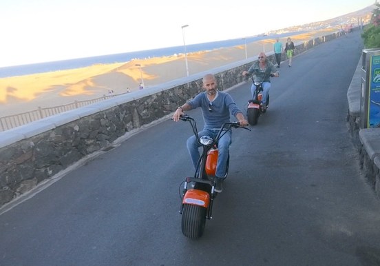 Zipping through Maspalomas with e-scooter chopper.jpg