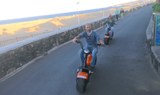 Zipping through Maspalomas with e-scooter chopper.jpg