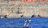 parasailing over water