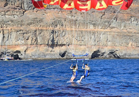 parasailing over water