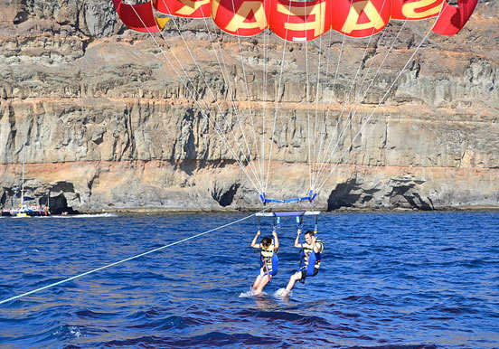 parasailing over water