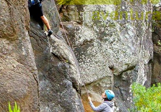 climbing steep rock formation in La Palma