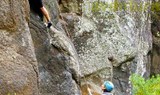 climbing steep rock formation in La Palma