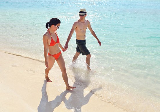 enjoy the white sand beach and clear waters in Fuerteventura