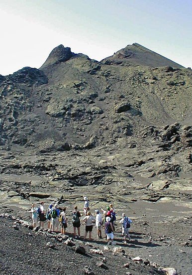 hiking on volcanic moon landscape in Lanzarote