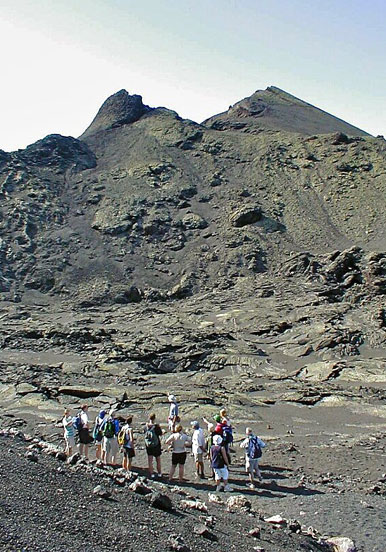 hiking on volcanic moon landscape in Lanzarote