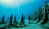 Diving to visit underwater sculptures.jpg