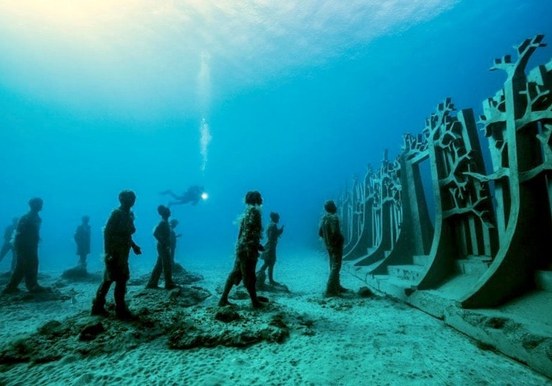 Diving to visit underwater sculptures.jpg