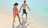 enjoy the white sand beach and clear waters in Fuerteventura