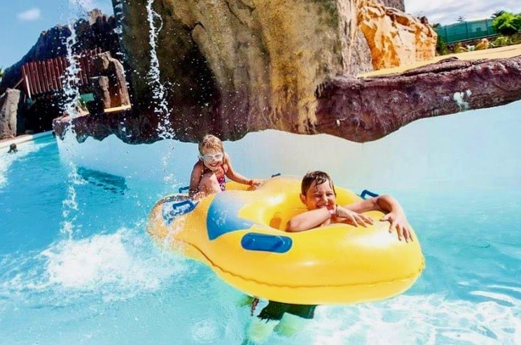 Kids under the waterfall Aqualava waterpark.jpg