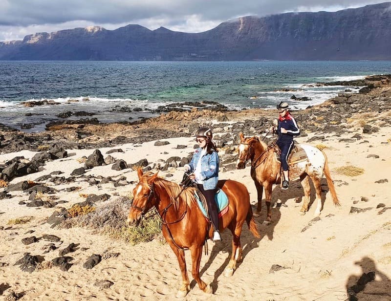Horse riding on sand Lanzarote.jpg