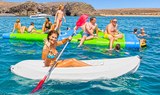 enjoy the Papagayo bay under the sun in kayak and floating mattress
