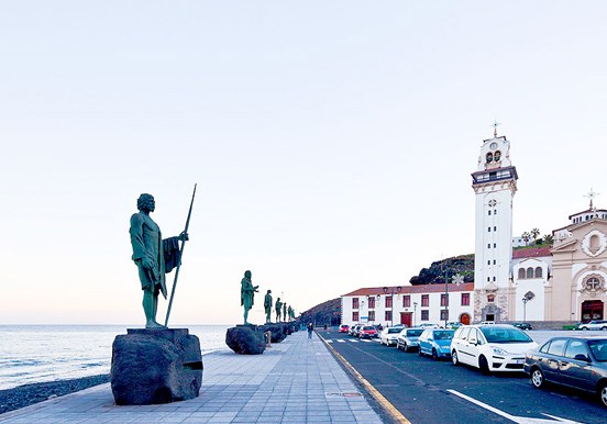 visit the statues of Guanches by the shore