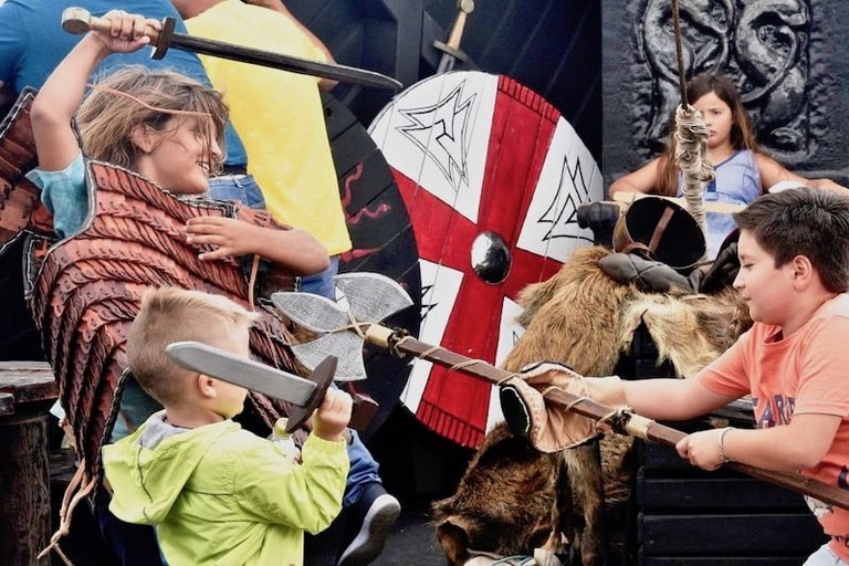 Children viking role play on ragnarok boat trip.jpg