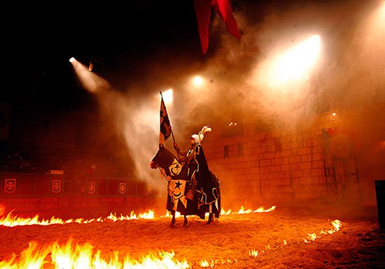 Medieval show horse and live fire effects in