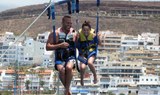 father and daughter parascending in Tenerife