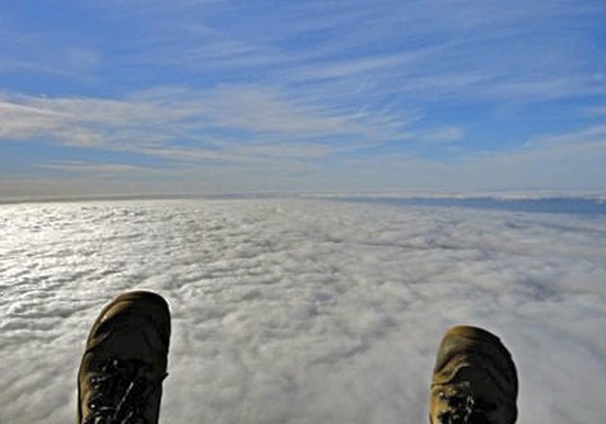 Paragliding over clouds in Izaña