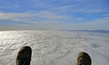 Paragliding over clouds in Izaña