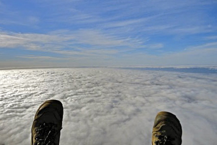 Paragliding over clouds in Izaña