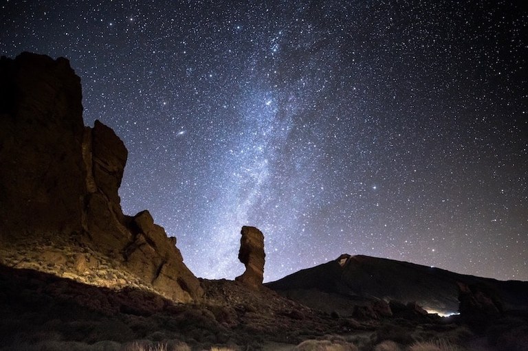Roques de Garcia and starry night on Teide.jpg