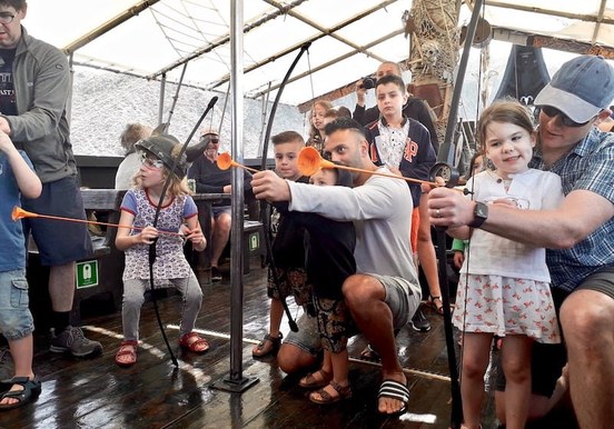 Arrow shooting game on board viking boat excrusion Tenerife.jpg