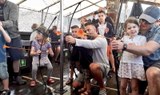 Arrow shooting game on board viking boat excrusion Tenerife.jpg